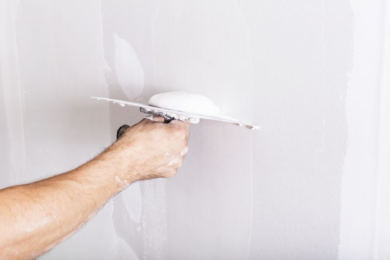 Skim Coating Experts at Work